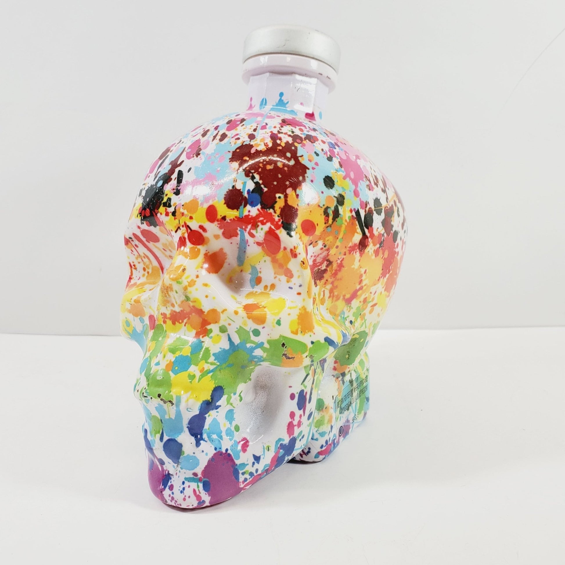 Crystal Head Vodka Bottle with Paint Your Pride Splatter Design - Unique Collectibles
